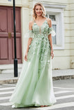 Vestido de fiesta de tul verde con mangas extraíbles con apliques
